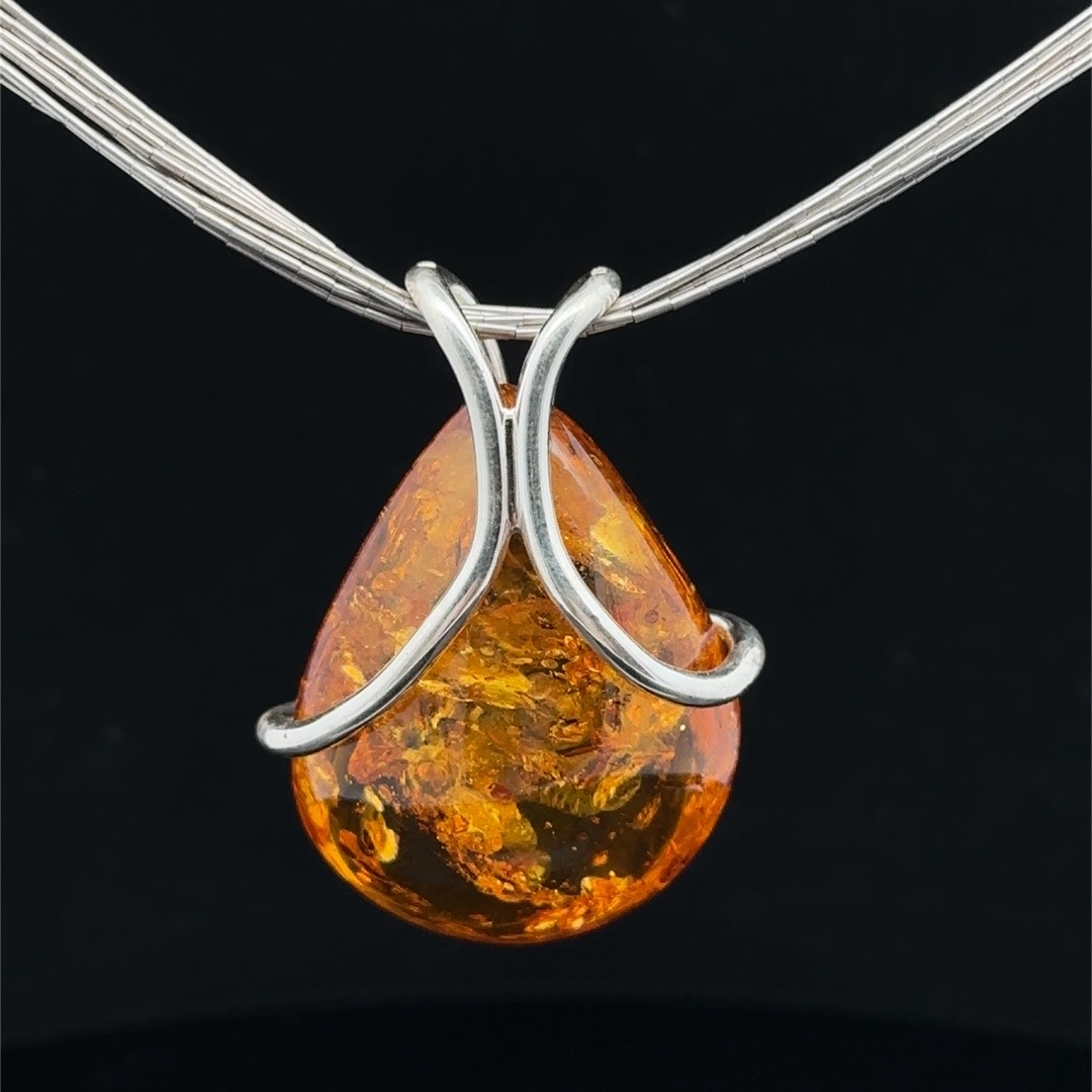 Large teardrop amber and 925 silver pendant