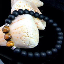 Alternative view of Bracelet onyx dépoli et oeil de tigre 8mm