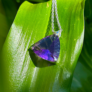 Faceted amethyst and silver pendant