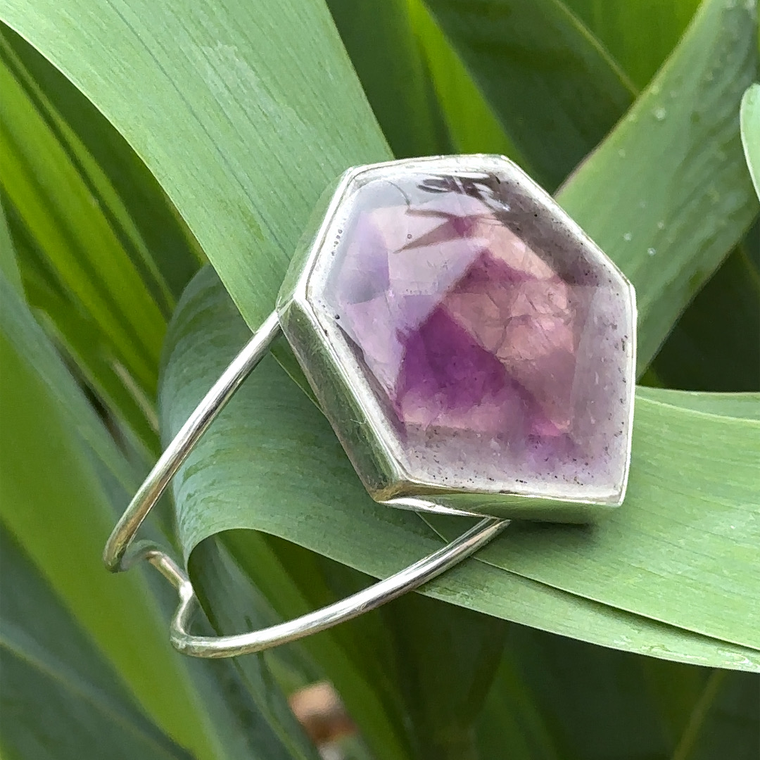 Adjustable rhodium-plated silver bangle with trapiche amethyst