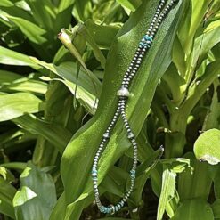 Long necklace in aged silver and turquoise chips