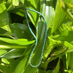 Turquoise and gold bead necklace