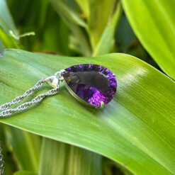 Faceted amethyst and silver teardrop pendant