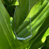 Fine silver necklace with 12 faceted blue topazes