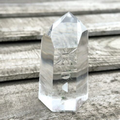 Engraved rock crystal point - sun and moon motif